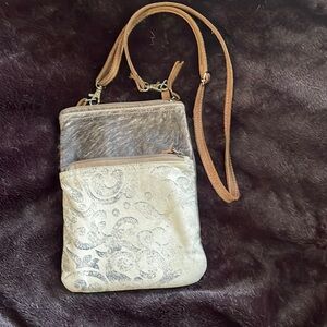 Myra hair on canvas crossbody bag.